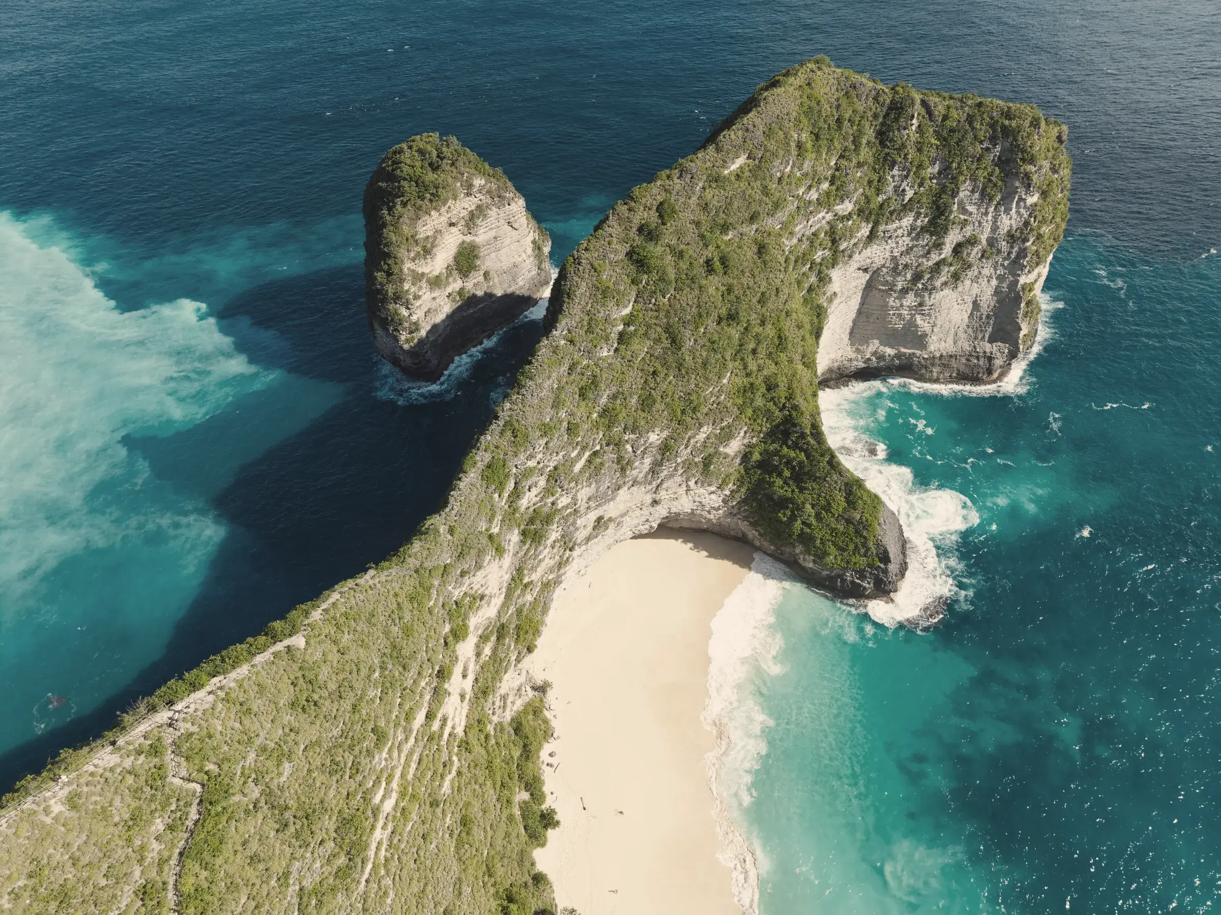 Aerial view of Kelingking Beach and its headland on Nusa Penida
