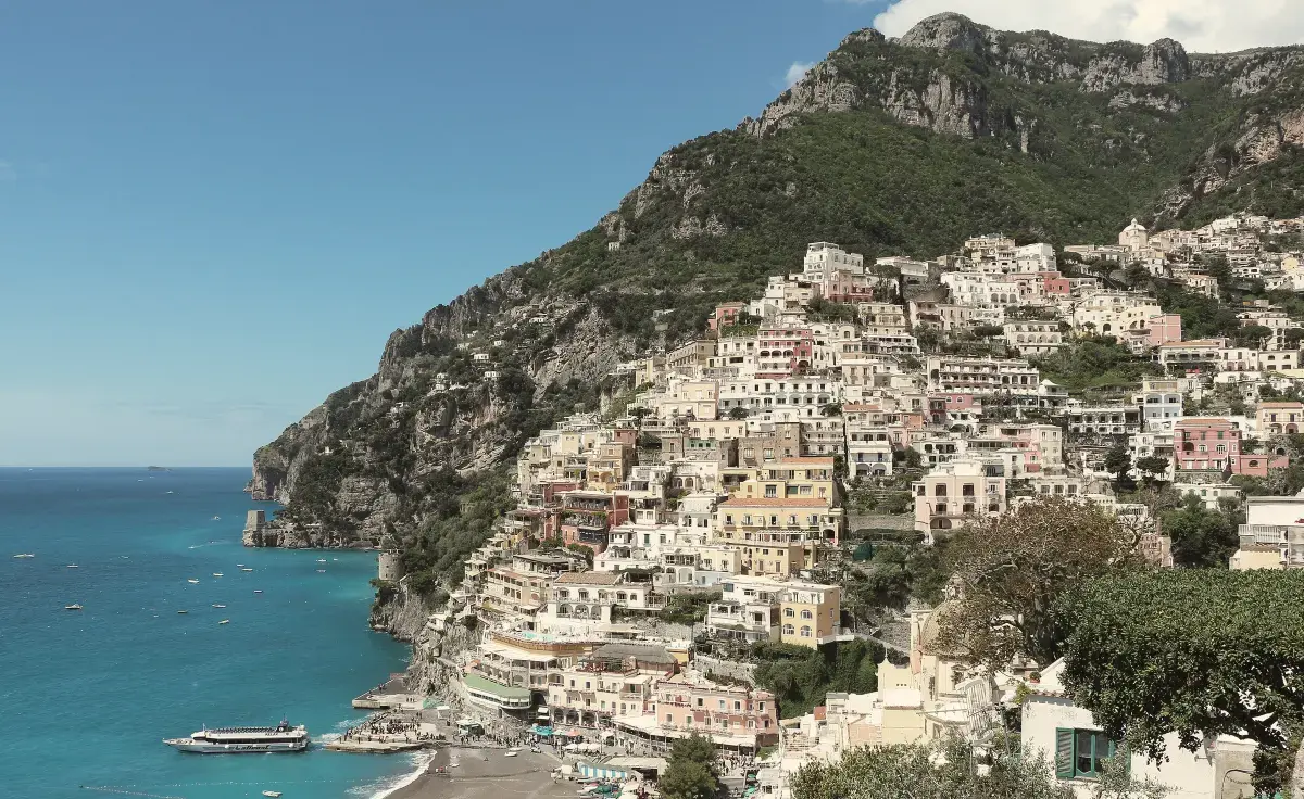 Positano's pastel houses climbing the cliffs above the Tyrrhenian Sea
