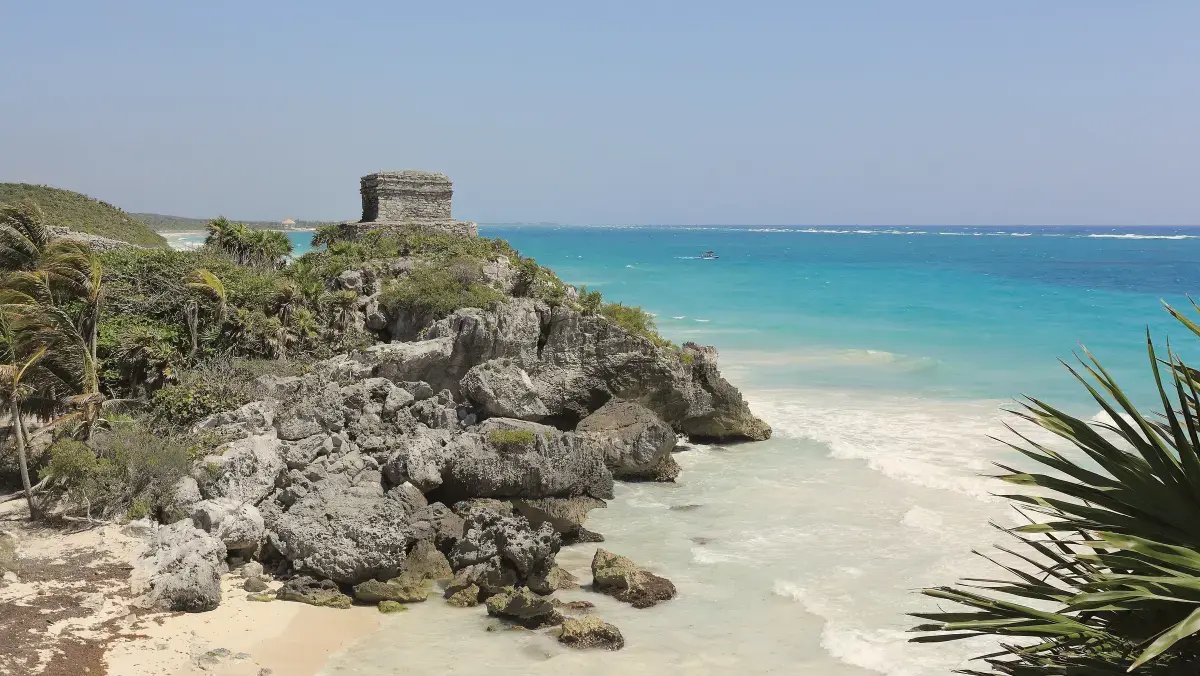 Temple of the God of the Winds above a turquoise cove, Tulum